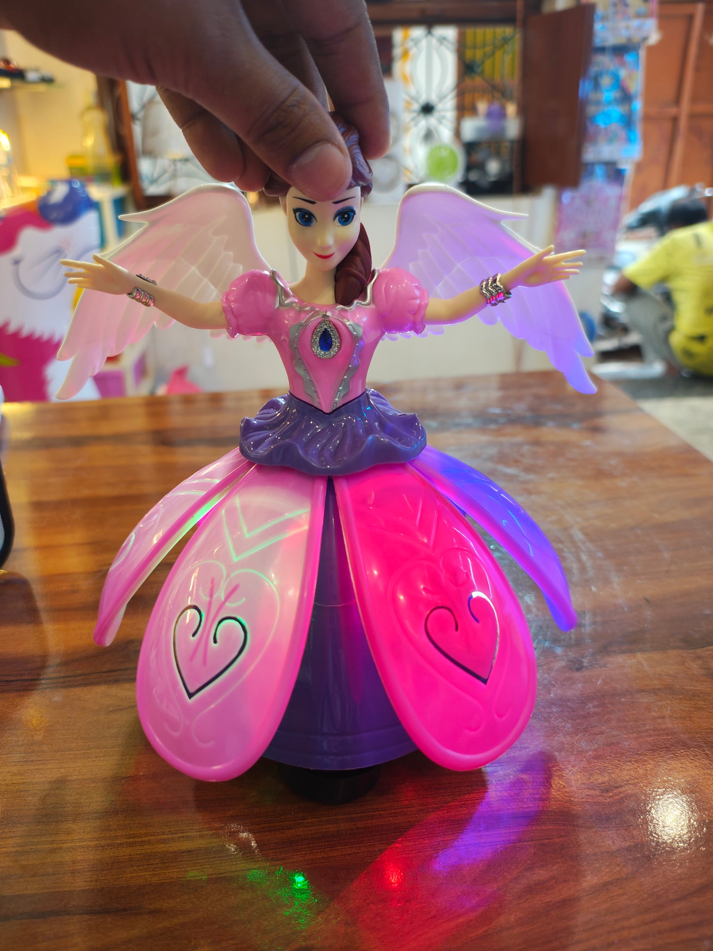 Barbie doll with 360° rounding light and music